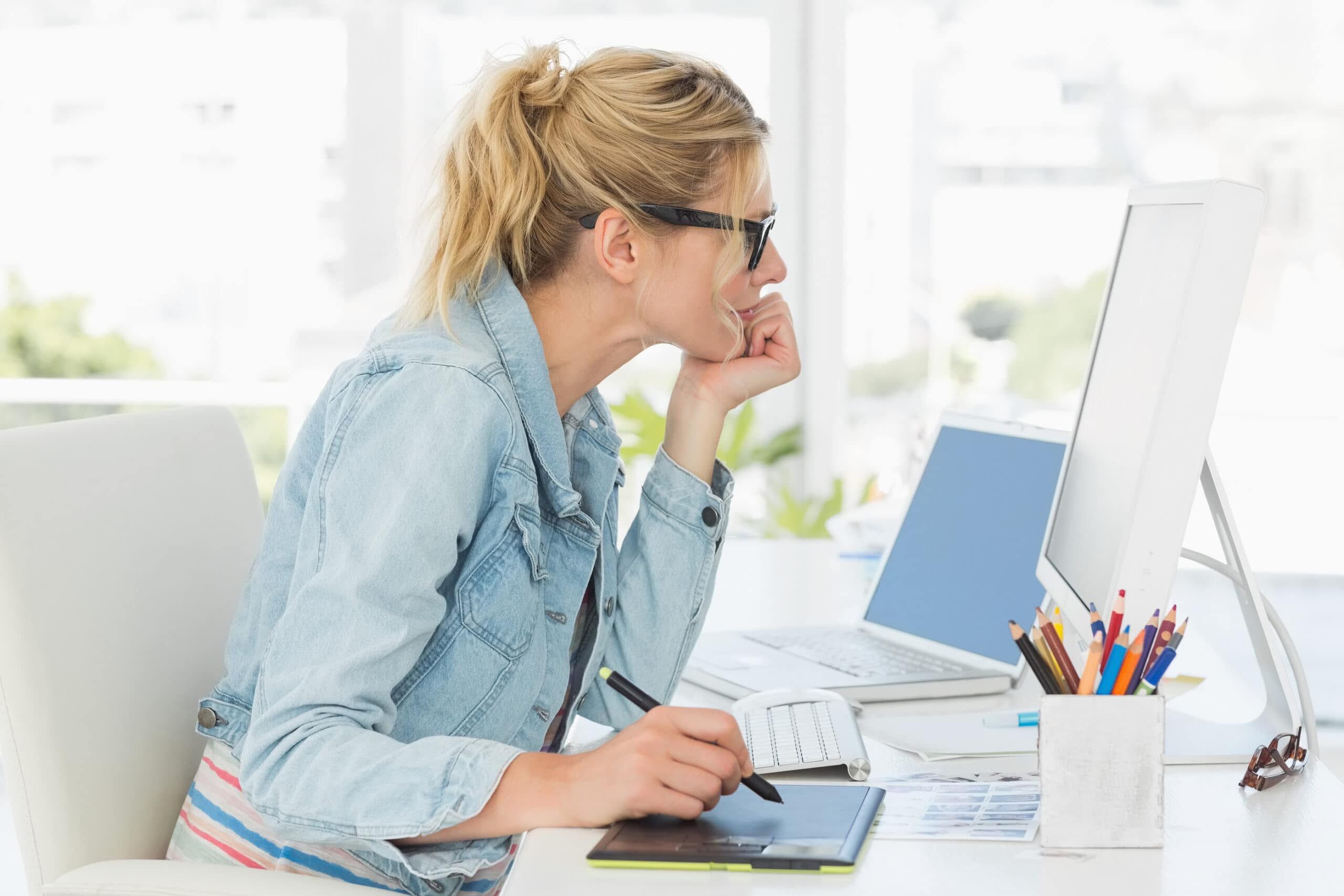 bigstock young woman helps senior man 121214933 bigstock Blonde pretty designer using d 61617851 scaled